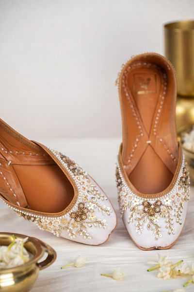 Gold floral embroidered juttis