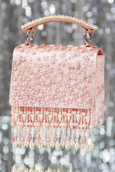 Pink embellished clutch