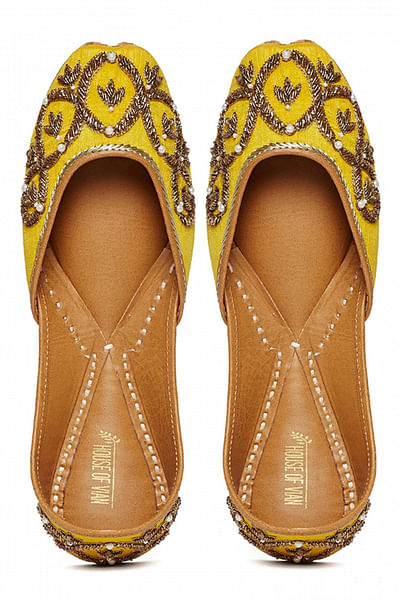 Yellow hand embroidered juttis