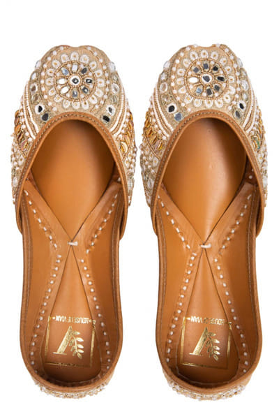 Ivory and gold embellished juttis