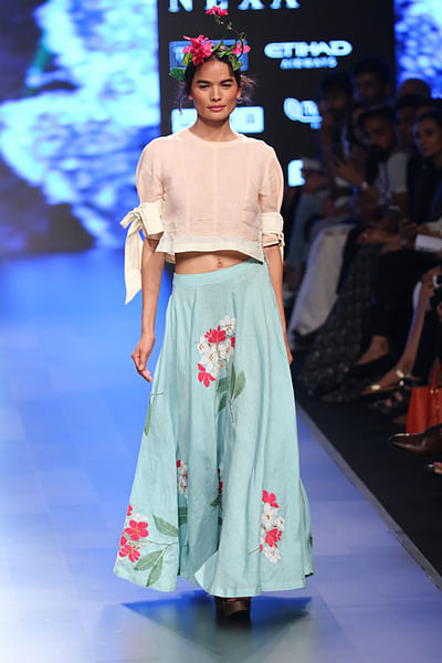 Colour-block tie-up top paired with embroidered linen skirt