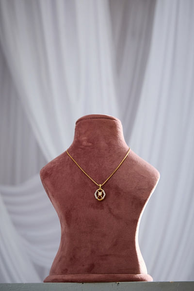 White and gold pendant