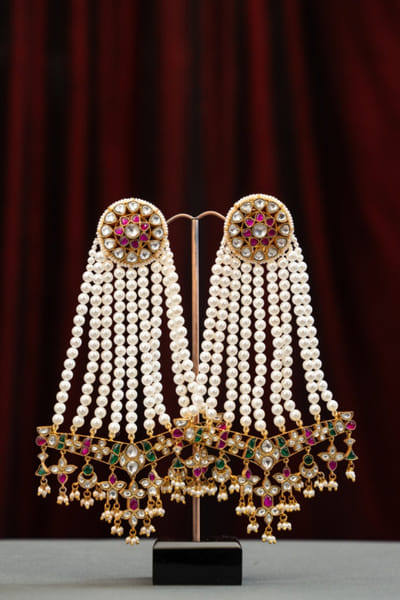 White pearl embellished chandelier earrings