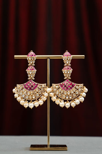 Gold pearl embellished dangler earrings