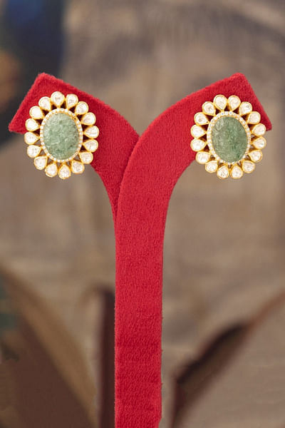 Green stone and polki embellished stud earrings