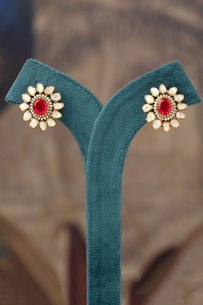 Red stone and polki embellished stud earrings