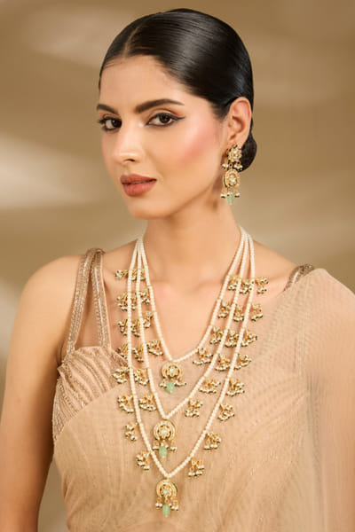 White pearl embellished layered necklace set