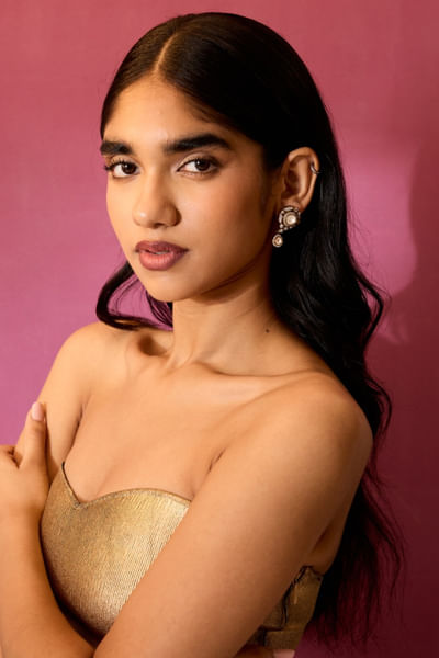 Gold and white jhumka earrings