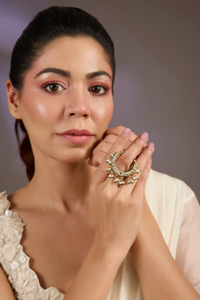White crescent kundan stone embellished ring