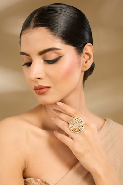 Gold toned stone encrusted ring