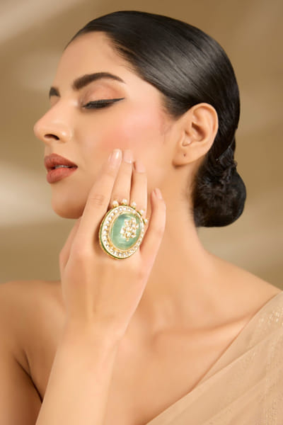 Green stone and pearl encrusted ring