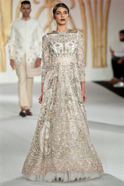 Ivory and gold adorned gown