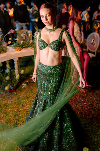 Emerald green embroidered cape lehenga set