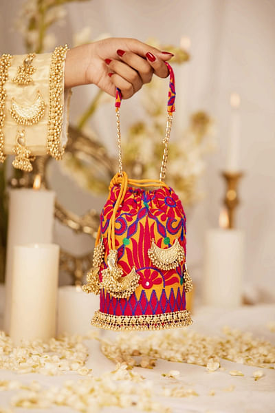 Mustard thread-crescent embellished bucket bag