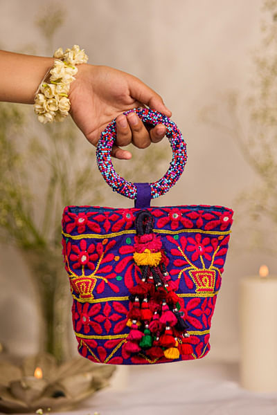 Multicolour embroidered and tasselled handbag