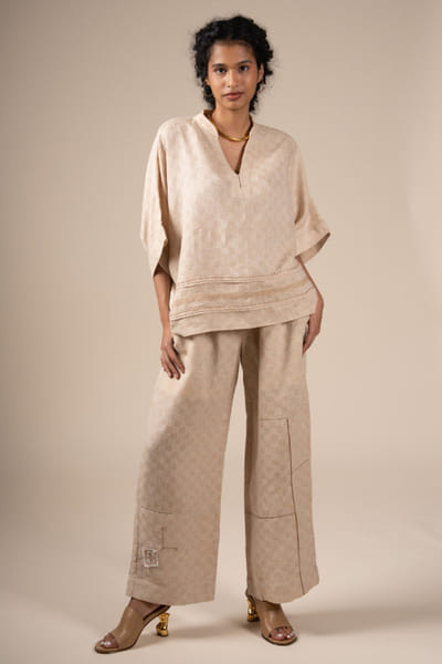 Subtle Shuttle Studio Beige hand embroidered linen pants SUBTJUN26D146454