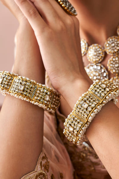 White kundan encrusted bangles
