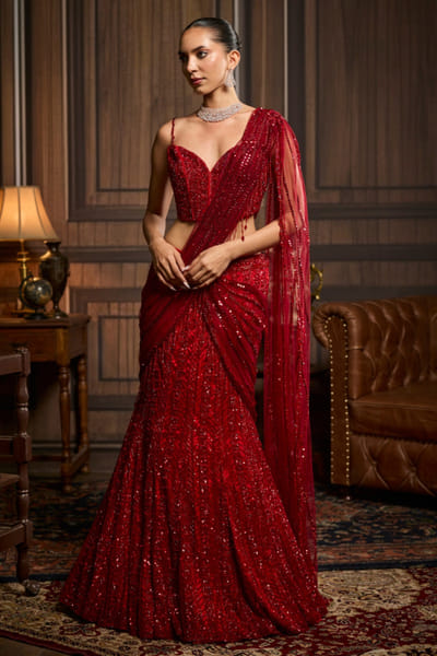 Red embellished pre-draped skirt sari set