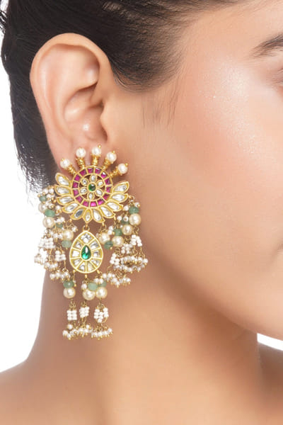 Red and green kundan embellished earrings