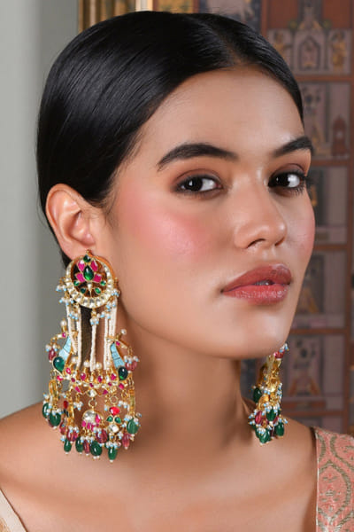 Turquoise and pink kundan embellished earrings