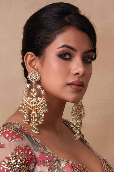 Green and white kundan and onyx earrings
