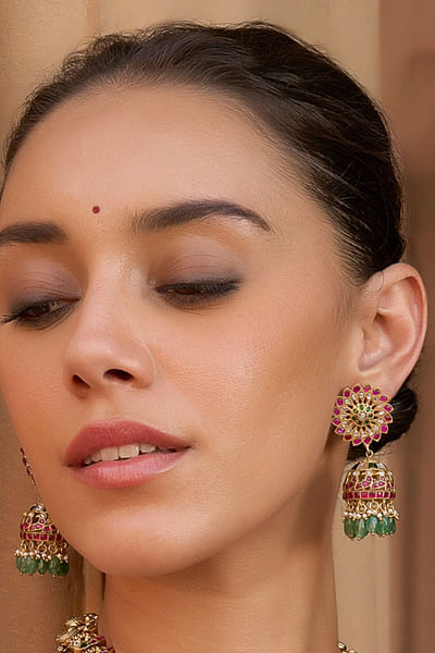 Pink and green kundan and onyx jhumkas