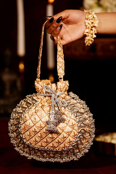 Gold peacock-beaded and tasselled potli bag