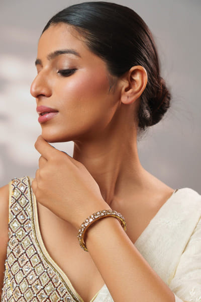 Gold toned kundan polki bangle set