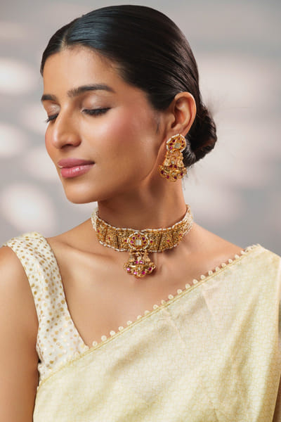 Gold finish kundan temple choker set