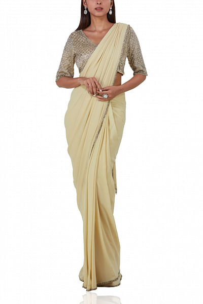 Embroidered blouse paired with draped sari