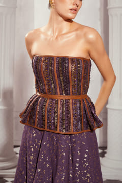 Buy Aubergine embroidered peplum corset by Nikita Mhaisalkar at