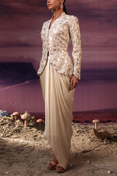 Ivory peplum jacket and draped skirt