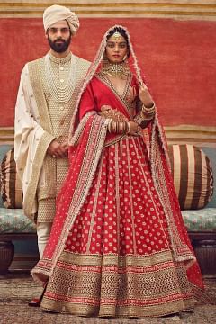 Sabyasachi red lehenga deals